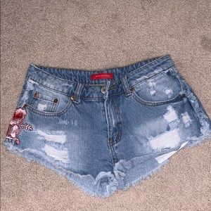 Denim shorts with floral design